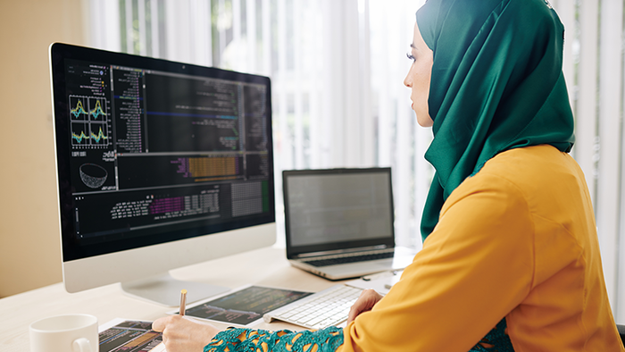 student sitting at computer