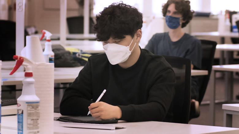 students in class with masks